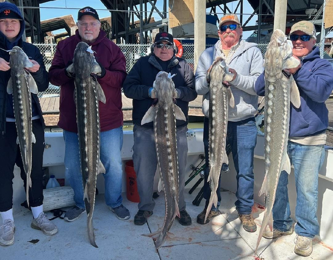 Dragon Sport Fishing Group w/ Sturgeon